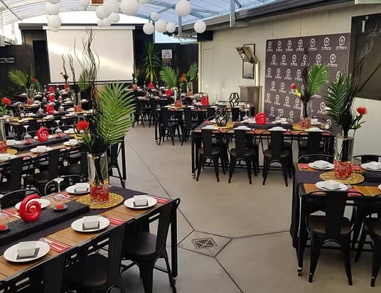 Full function room set for a group dinner at Three Furlongs