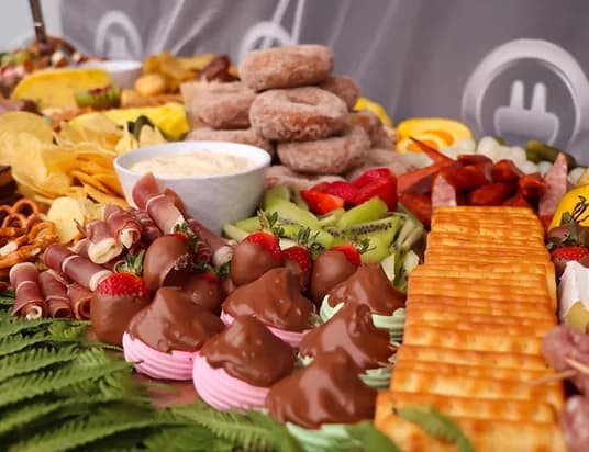 Close-up of a grazing platter with fruit, cheese and snacks at Three Furlongs