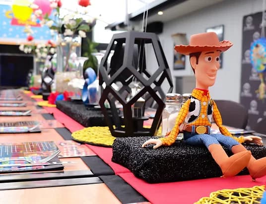 Toy Story themed table detail at a Three Furlongs function