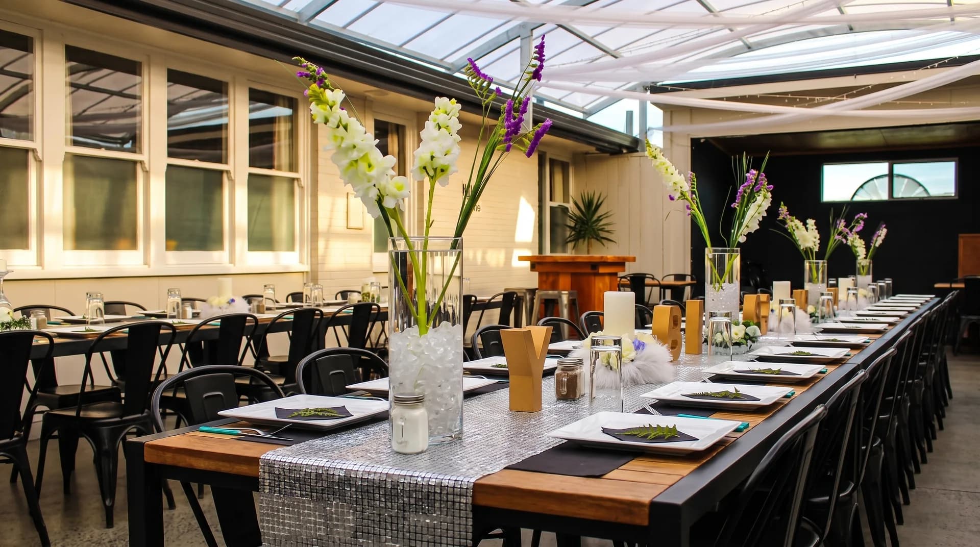 The Three Furlongs function room set for a group dinner