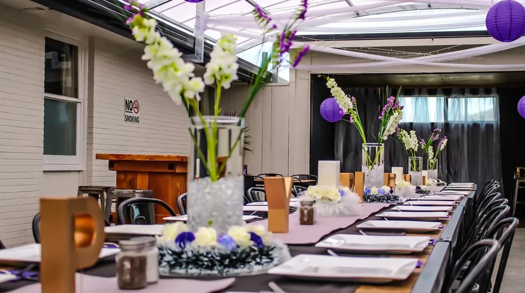 The Three Furlongs function room set for a group dinner